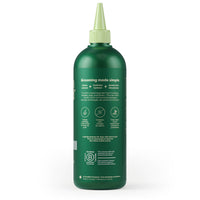 Earth Rated 3 in 1 Dog Shampoo Short Coat bottle showing product label and ingredients panel details