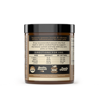 Complete Natural Products Organic Chaga Mushroom Powder being sprinkled over dog food in a feeding bowl