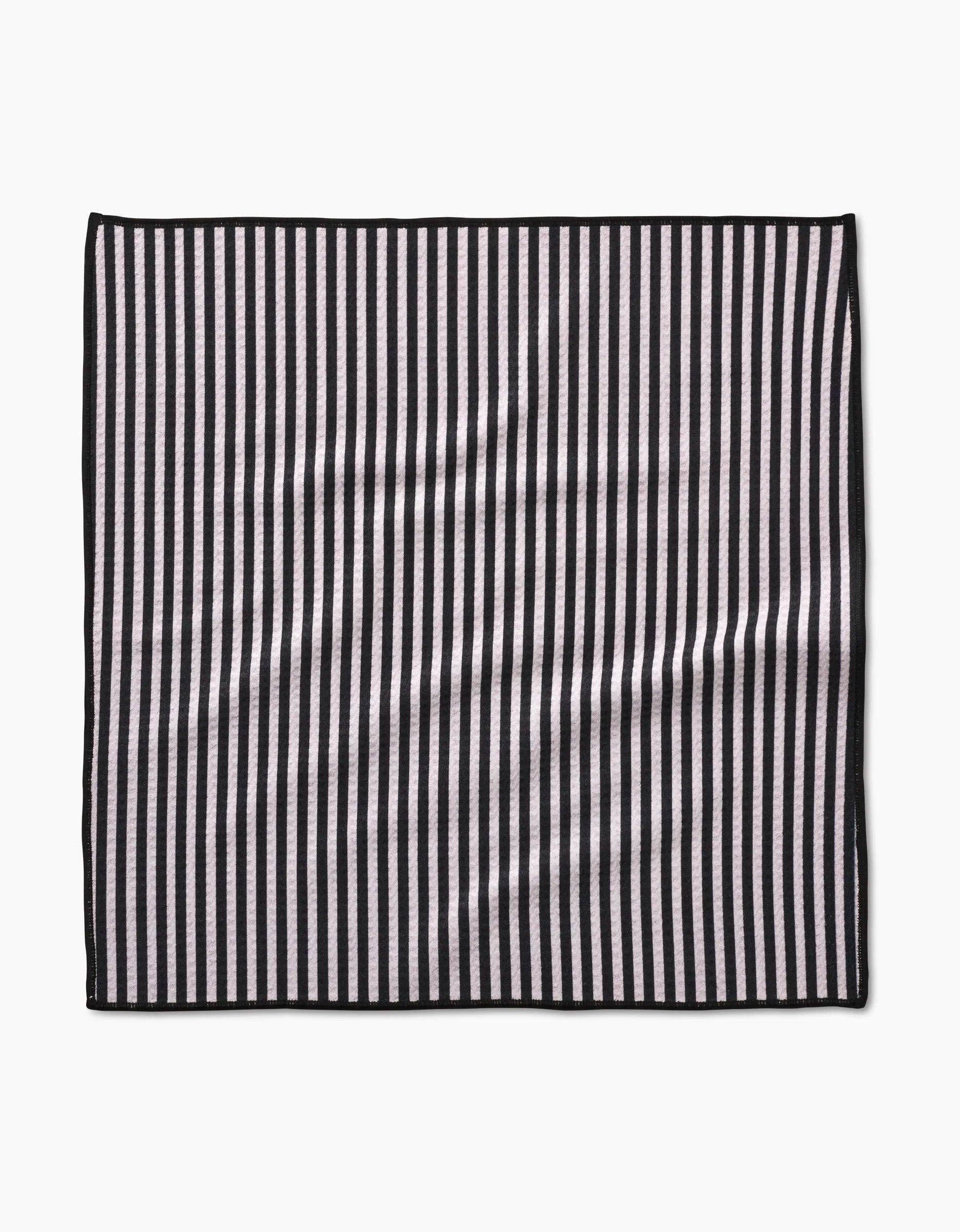 Good Pup Paw Towel by Geometry in neutral color showing compact 18x18 inch absorbent fabric texture.