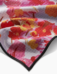 Geometry Pup Florals Paw Towel showing detailed view of colorful floral pattern and soft Geoweave fabric texture.
