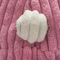 HuggleGroup Bitsy Bunny Knottie toy shown from side angle displaying plush texture and durable construction details.