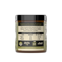 Complete Natural Products Organic Kelp Powder being sprinkled over dog food in a feeding bowl.