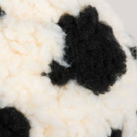 HuggleGroup HuggleFleece Soccer Ball showing detailed stitching and soft fleece texture in black and white pattern.