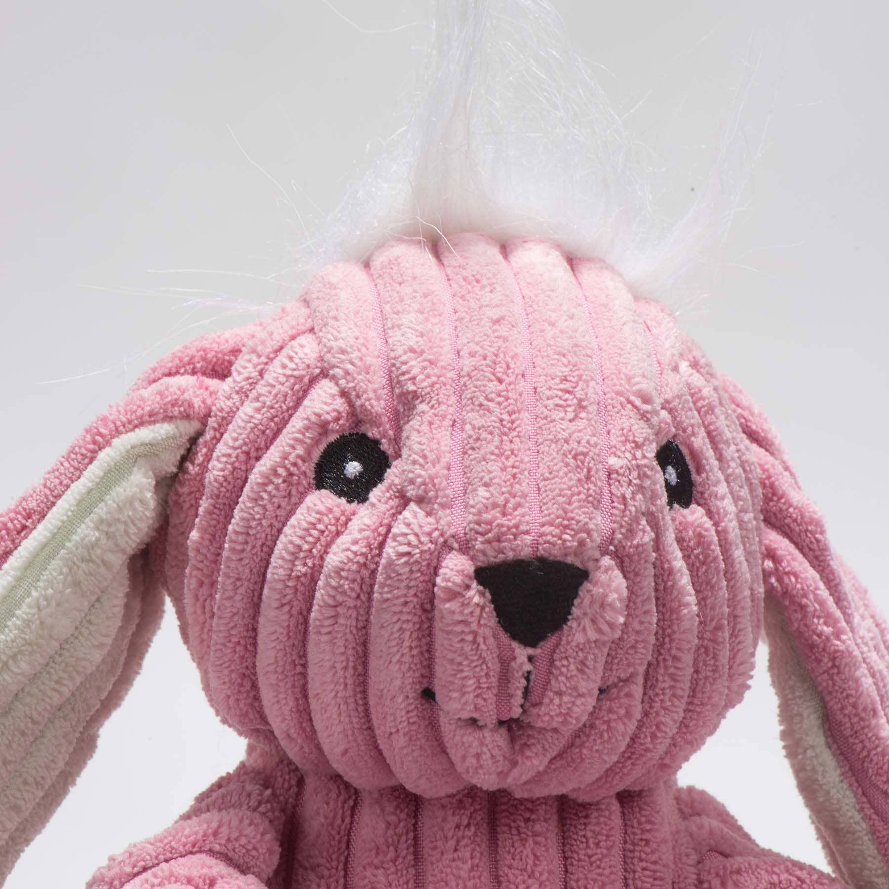 HuggleGroup Bitsy Bunny Knottie toy showing detailed stitching and plush fabric texture in close-up view.