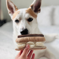 Lambwolf Collective Eclair snuffle toy showing textured cream-colored flaps and treat-dispensing pockets for dog enrichment.