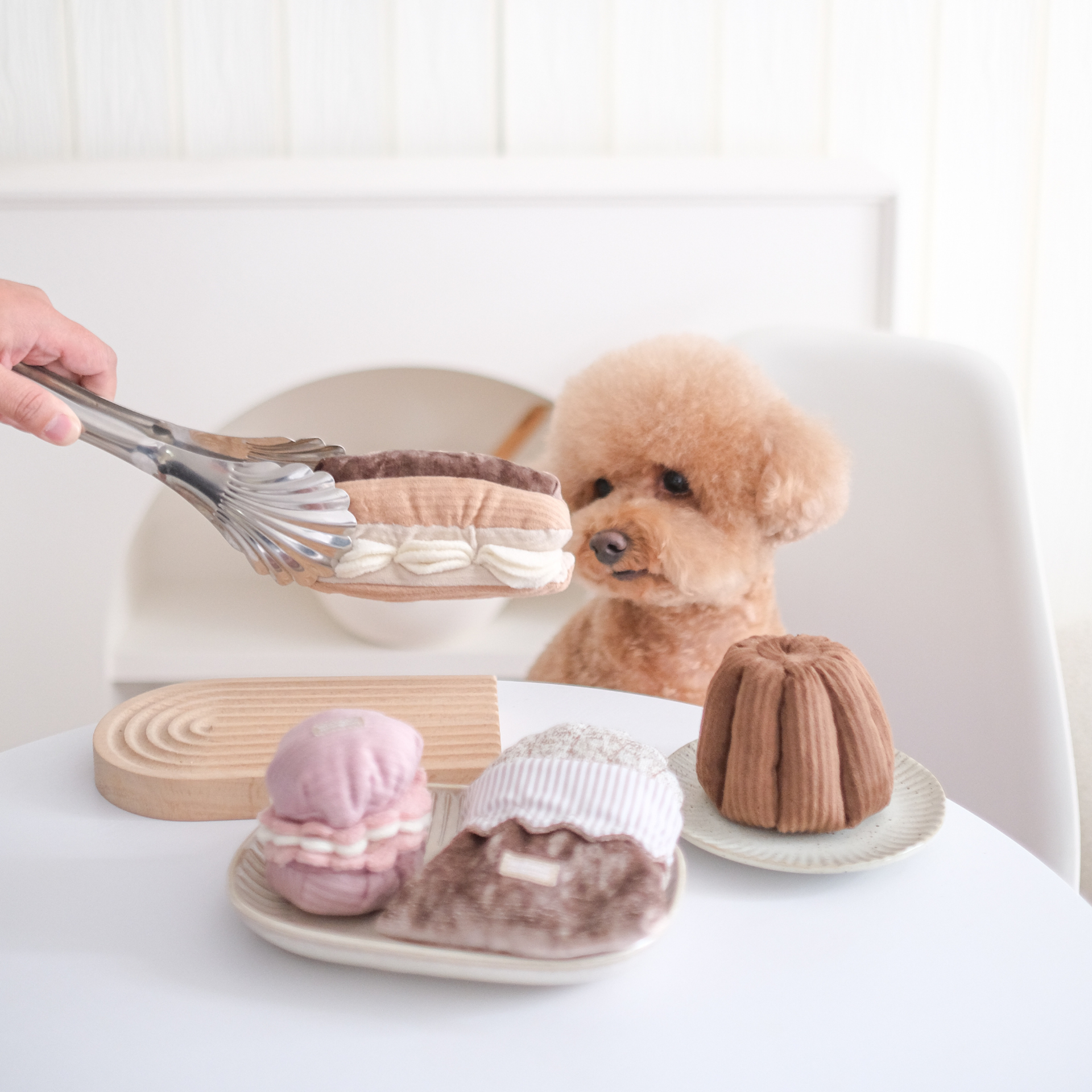 Lambwolf Collective Eclair snuffle toy showing textured cream-colored flaps and treat-dispensing pockets for dog enrichment.