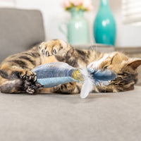 Huxley & Kent Sardine Kicker Cat Toy being played with by a cat demonstrating typical kicking behavior.