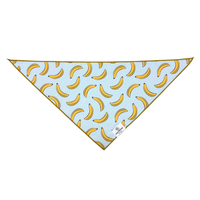 Rufflifepals Bananas dog bandana worn on an adorable dog, showing a fun lifestyle look.
