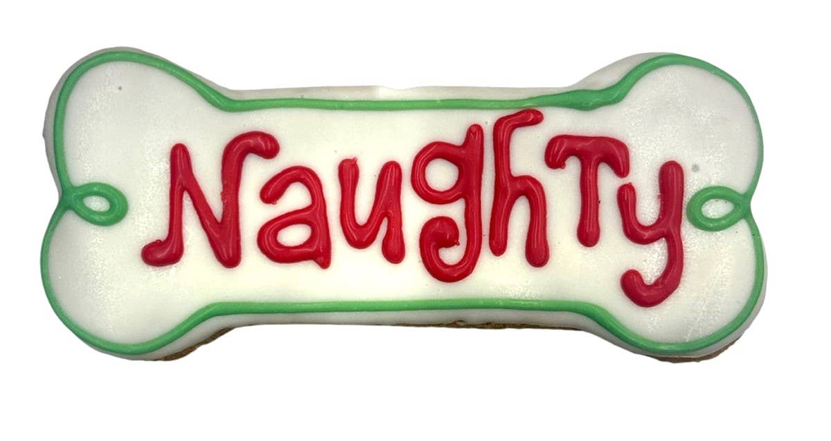 Close-up view of Paws Gourmet Bakery Holiday Naughty Bones showing detailed texture and festive bone-shaped design.
