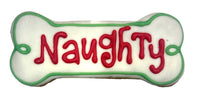 Close-up view of Paws Gourmet Bakery Holiday Naughty Bones showing detailed texture and festive bone-shaped design.