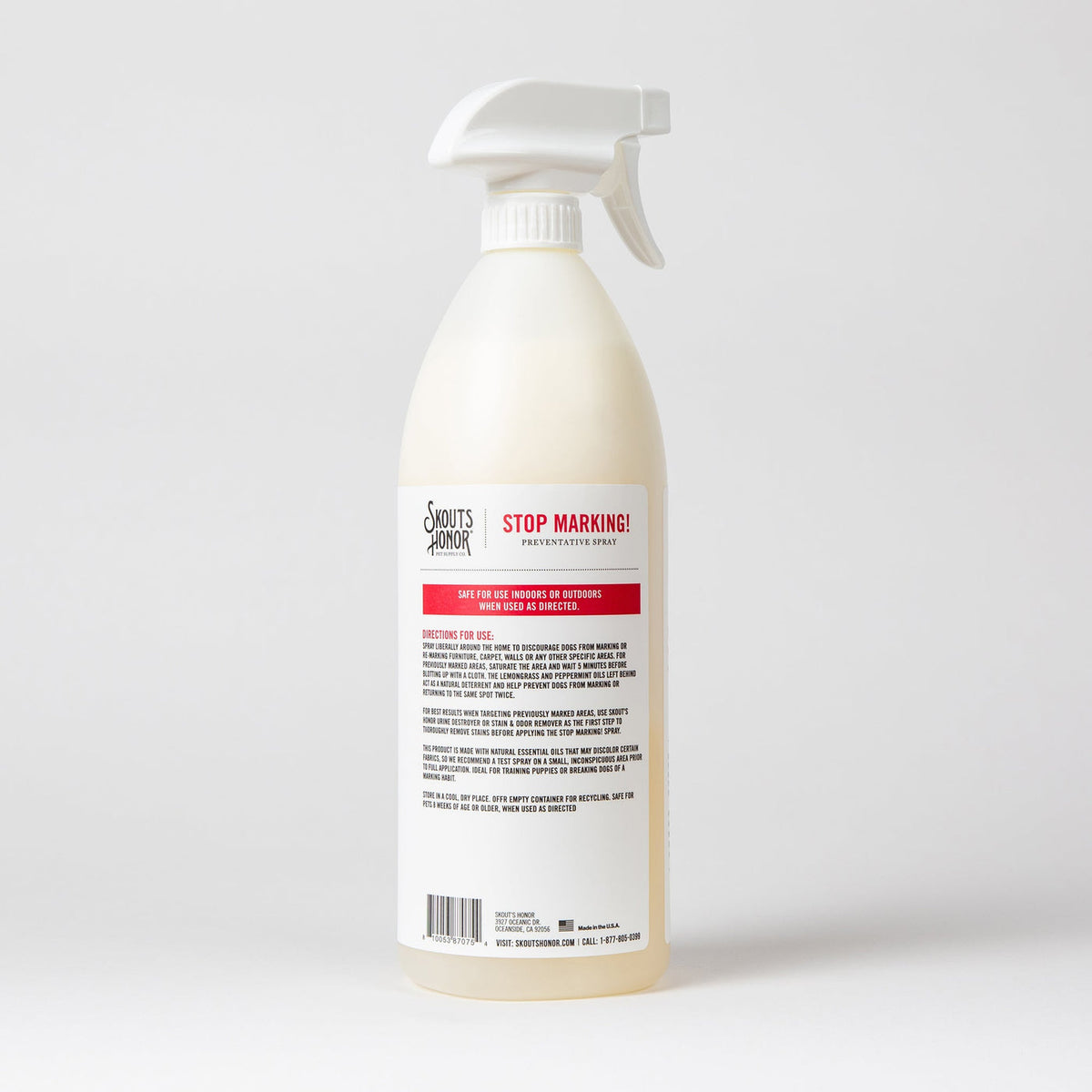 Close-up detail of Skout's Honor Stop Marking spray bottle showing label and product information.