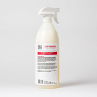Close-up detail of Skout's Honor Stop Marking spray bottle showing label and product information.