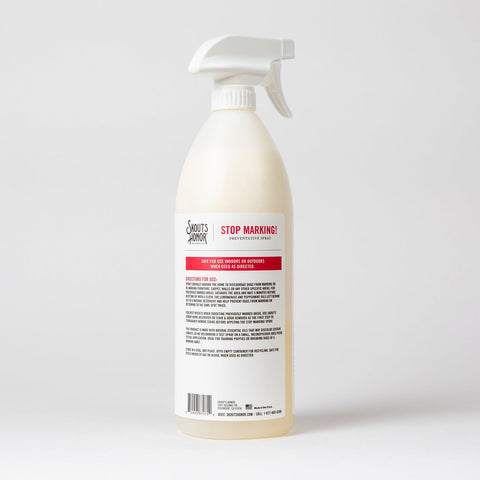 Close-up detail of Skout's Honor Stop Marking spray bottle showing label and product information.