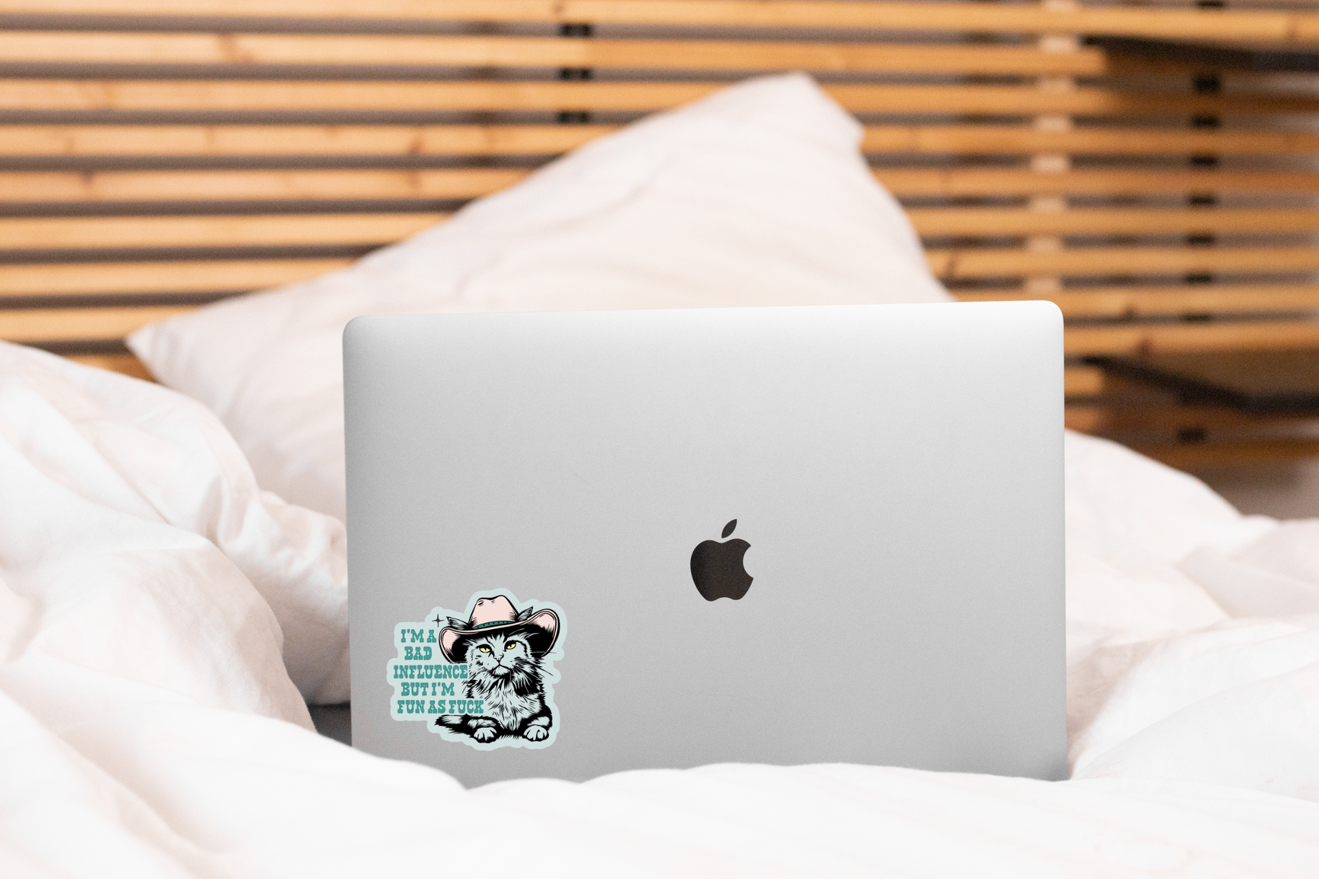 Yarnival I'm a Bad Influence sticker shown in a lifestyle setting highlighting its fun, bold design.