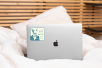 Yarnival A Very Wealthy Dog sticker applied to laptop showing premium vinyl decal in real-world use.
