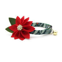 Made By Cleo Eden green cat collar displayed at an angle showing the breakaway safety buckle mechanism