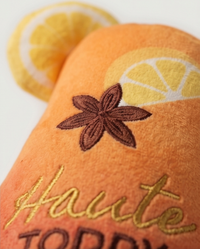 Haute Diggity Dog Haute Toddy holiday squeaker toy shown from an alternate angle highlighting its festive details.