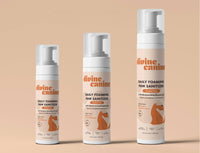 Divine Canine Foaming Paw Shampoo bottle being applied to a dog's paw demonstrating the rinse-free foam formula