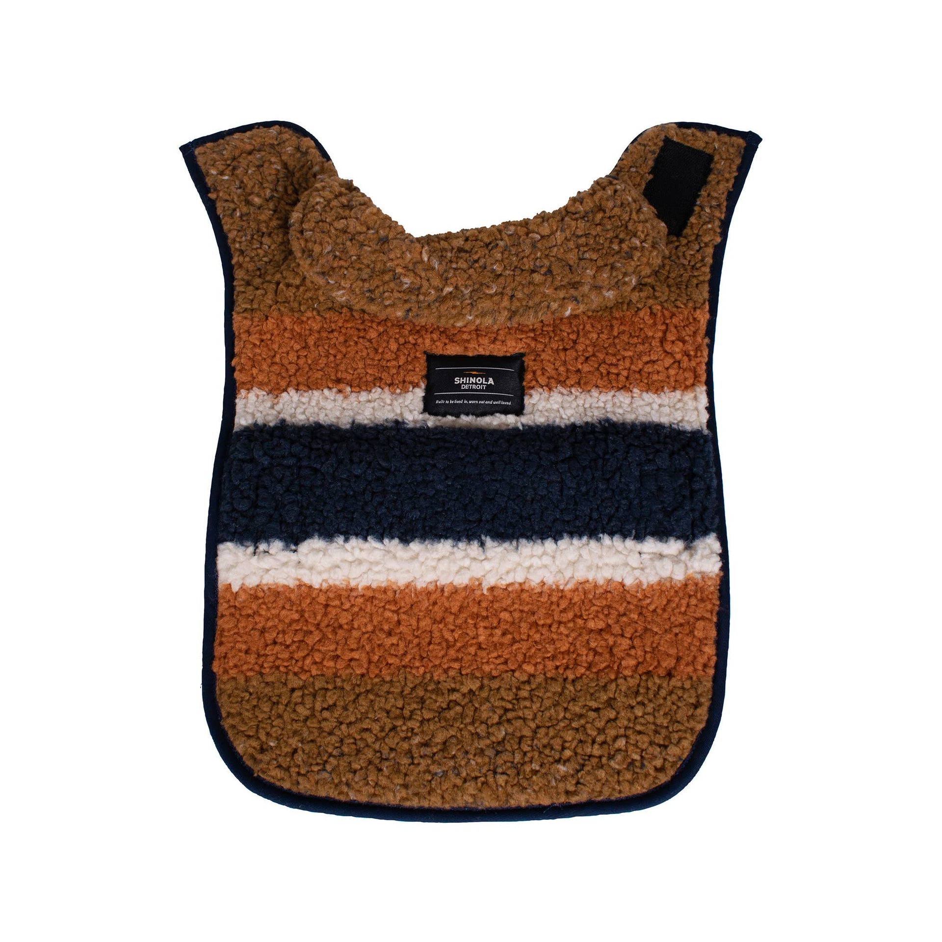 Shinola Pet brown barn-style dog coat showing adjustable strap and buckle closure detail from Carolina Pet Company.