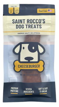 Saint Rocco's Singles treats shown in a lifestyle setting with a happy dog nearby.