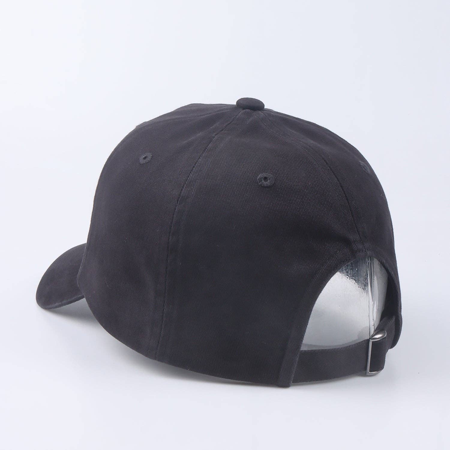 HATPHILE embroidered pug baseball cap shown from side angle displaying detailed pug face design on cotton material.
