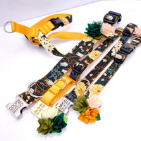 Mimi Green Succulent Dog Collar Accessory displayed on wooden surface showing handcrafted felt botanical details and attachment mechanism.