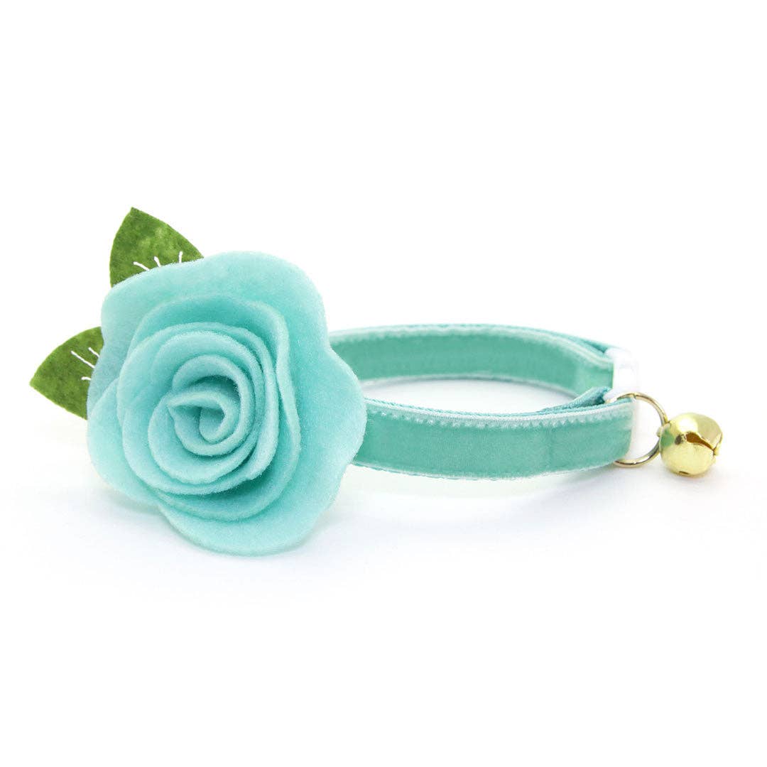 Made By Cleo Velvet Mint robin's egg blue cat collar displayed at an angle showing texture and buckle detail.