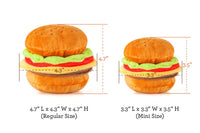 P.L.A.Y. American Classic Barky Burger MINI plush toy being enjoyed by a small dog during playtime