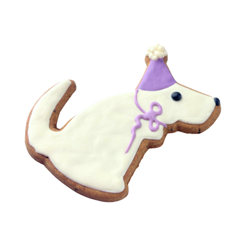 Daisy Bites Natural Dog Bakery purple birthday hat-shaped dog treat on a white background.