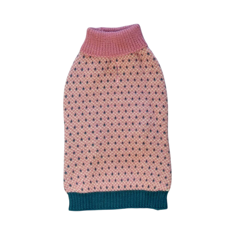 Close-up detail of Finnegan's Standard Goods Vintage Pink Ski Sweater showing texture and knit pattern.