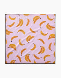 Pupnana Dog Towel by Geometry in yellow with banana print pattern, 30x30 inch size.
