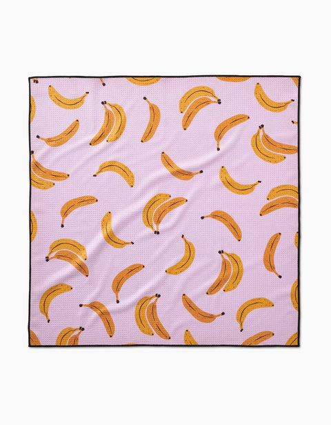Pupnana Dog Towel by Geometry in yellow with banana print pattern, 30x30 inch size.
