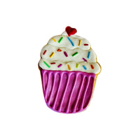 Cupcakes Cookies pet treats with colorful frosting-style decorations displayed against white background.