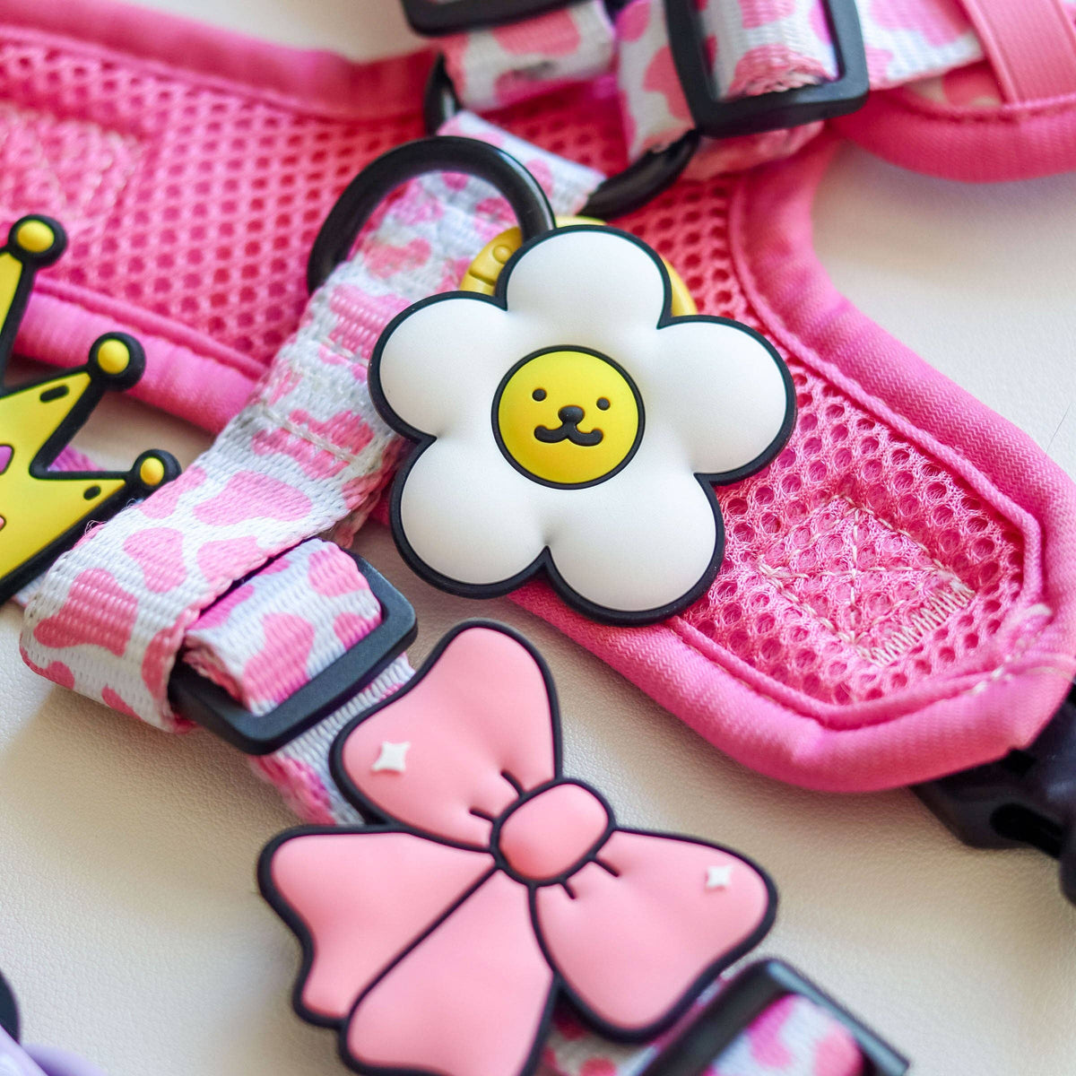 Close-up detail of the Jiby Dog Crew Daisy White Jiby Dog Charm showing texture and finish.