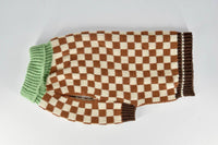 Finnegan's Standard Goods Campfire Check Sweater size chart or packaging detail shown up close.
