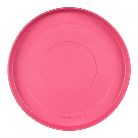 West Paw Zisc flying disc in geranium red color showing flexible material and bowl configuration detail.