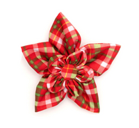 Red and green plaid bow on a white background