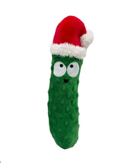 Green pickle-shaped toy with a Santa hat and 'shake to squeak!' label on a white background