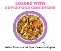 Weruva Awesome Belly beef and rice wet dog food can showing nutritional information and feeding guidelines on label.