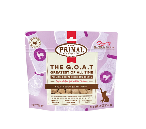 Primal freeze-dried chicken and goat milk cat treats package featuring minimalist white and blue branding design.