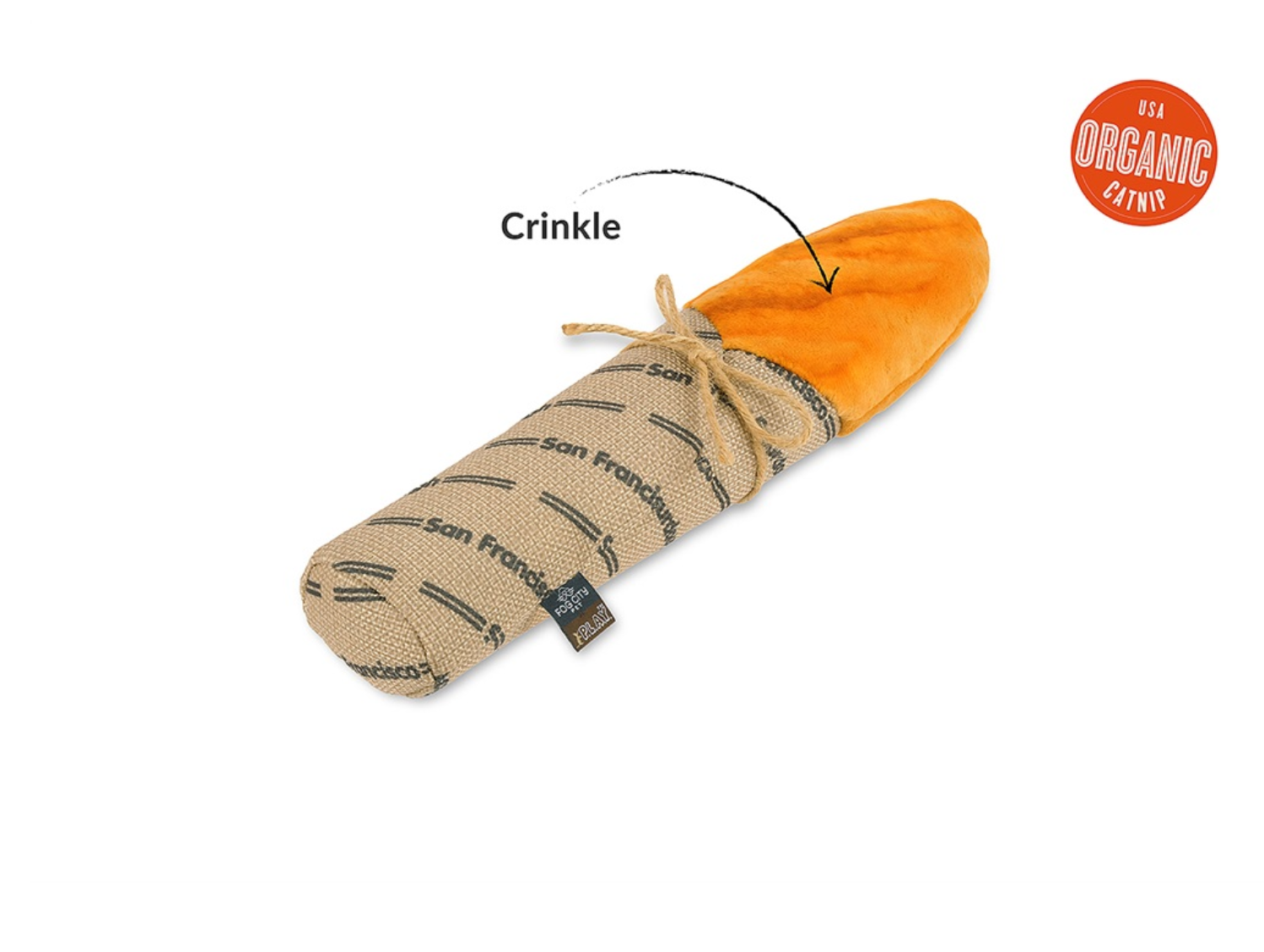 P.L.A.Y. Baguette Kicker cat toy being grabbed and kicked by a cat during active play.