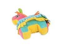 P.L.A.Y. Party Animal Piñata dog toy shown in lifestyle setting with happy dog playing and enjoying treats.