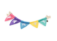 P.L.A.Y. Party Banner showing colorful pennant flags with varied textures and patterns for interactive dog play.