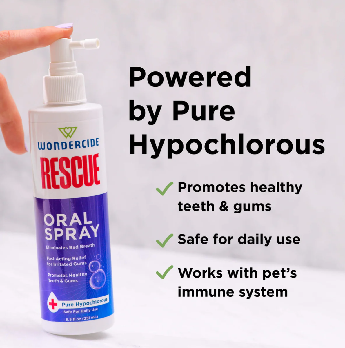 Wondercide Oral Spray shown in use, demonstrating application of the pet dental grooming product.