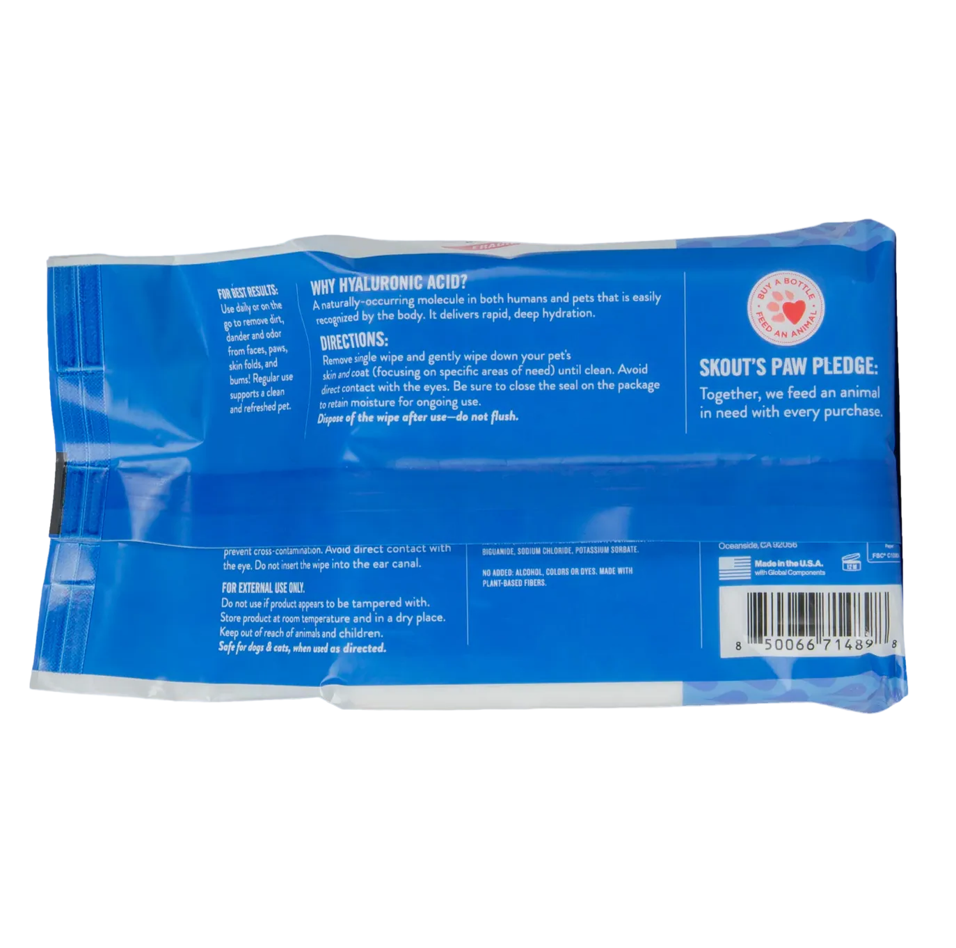 Skout's Honor HydroClear grooming wipes being used on a dog's paw showing practical application