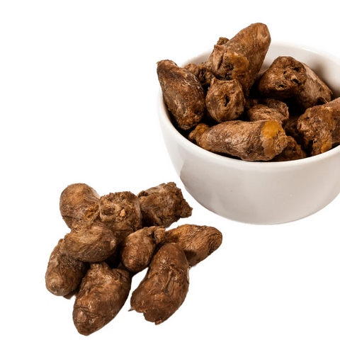 Close-up view of Momentum freeze-dried chicken heart cat treats showing texture and natural brown color.