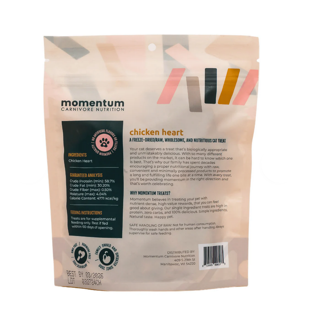 Momentum freeze-dried chicken heart cat treats scattered on surface showing natural texture and size
