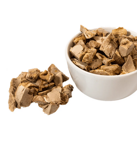 Momentum freeze-dried chicken gizzard cat treats showing detailed texture and individual pieces in close-up view.
