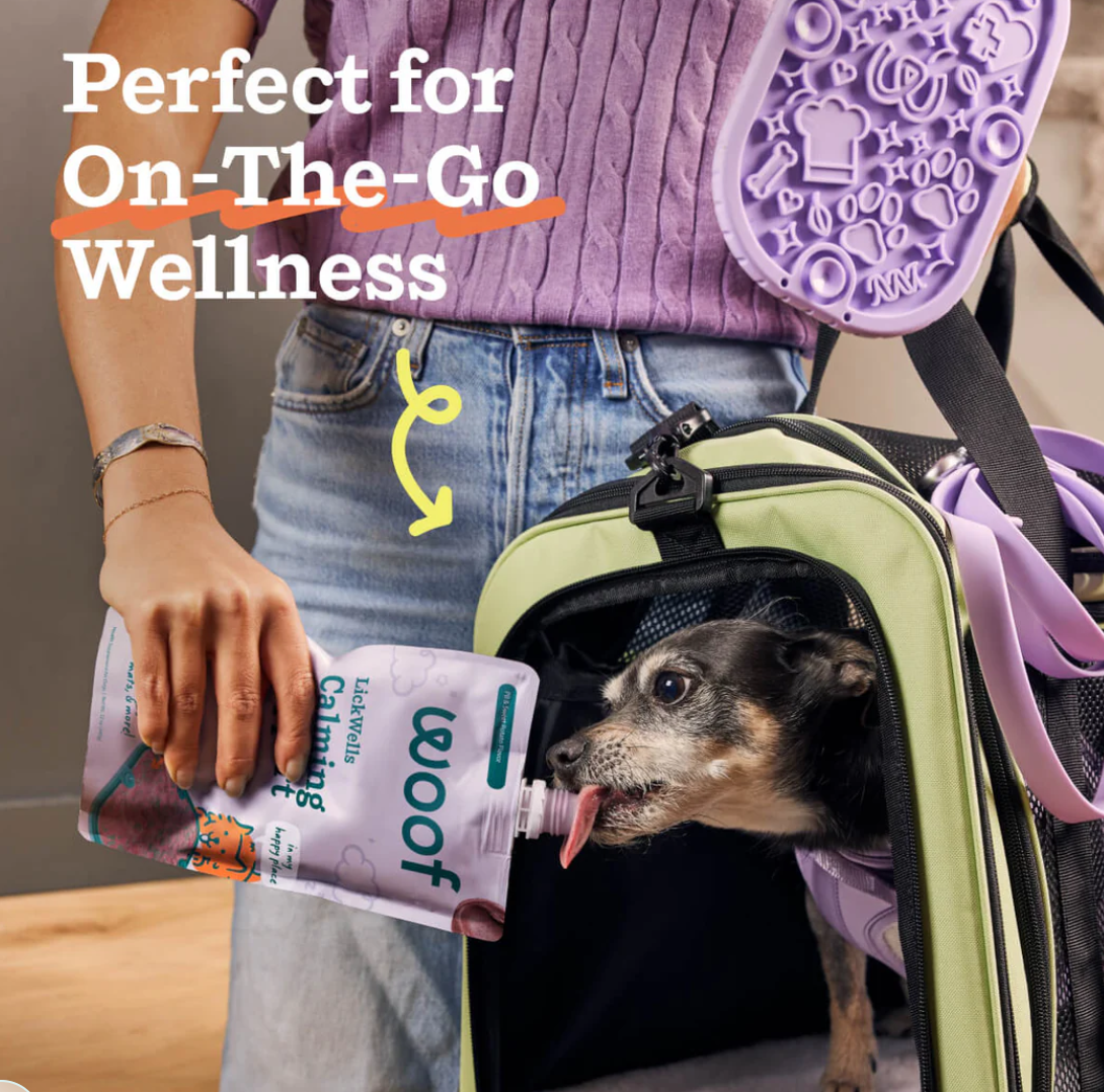 Woof LickWells pet treats package shown from an alternate angle highlighting product details.