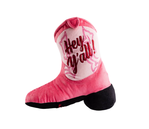 Pink plush cowgirl boot dog toy by Haute Diggity Dog with decorative stitching and Western-style design.